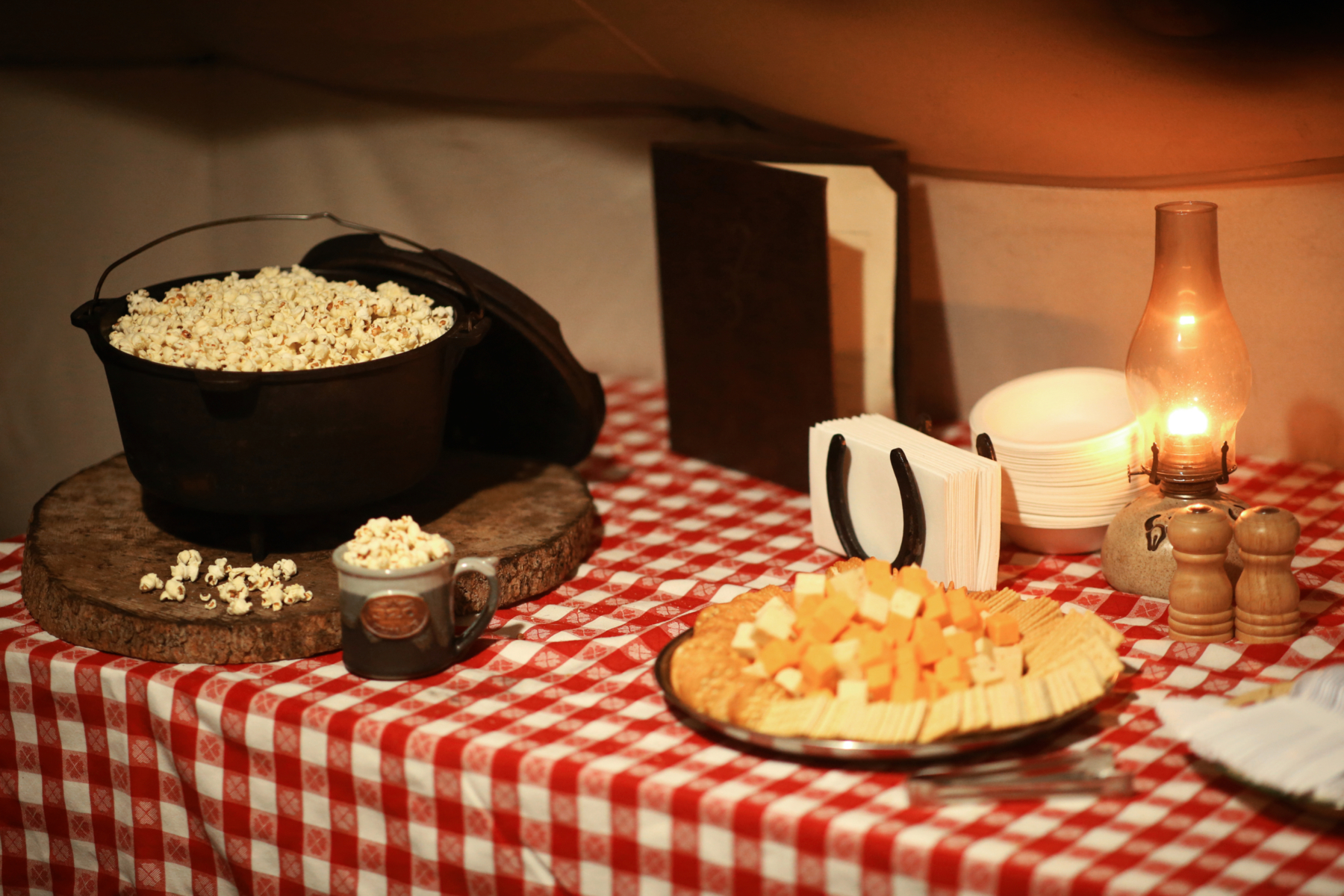 47 sleigh ride appetizers.Bree Hokana Photography Delicious snacks of cheese, crackers, and popcorn served on a scenic sleigh ride in the snow