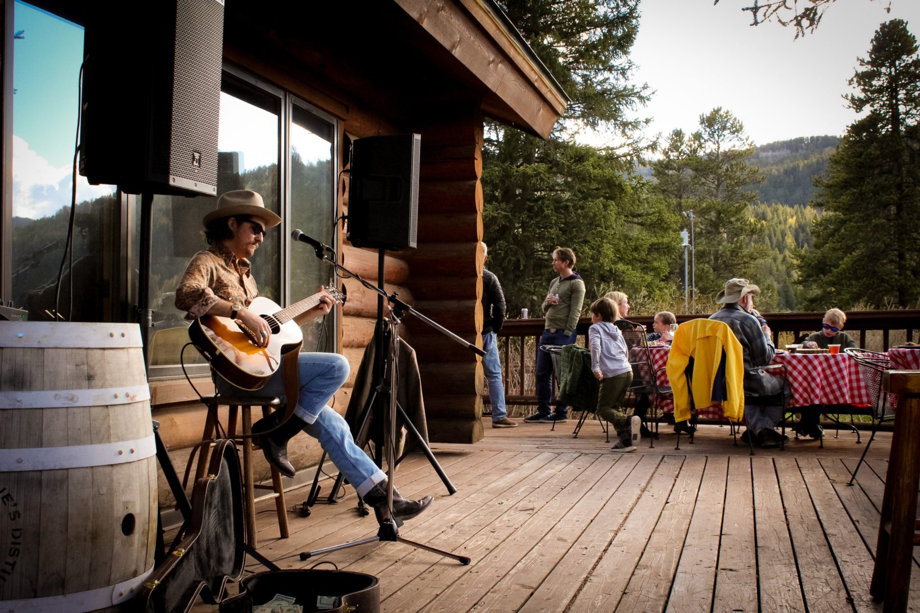 Chandler Huntley plays live music for the Porch Side Picnic at 320 Guest Ranch