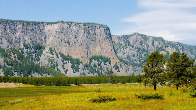 Things to Do in West Yellowstone: A stunning landscape portrait of a plateau in Yellowstone National Park.