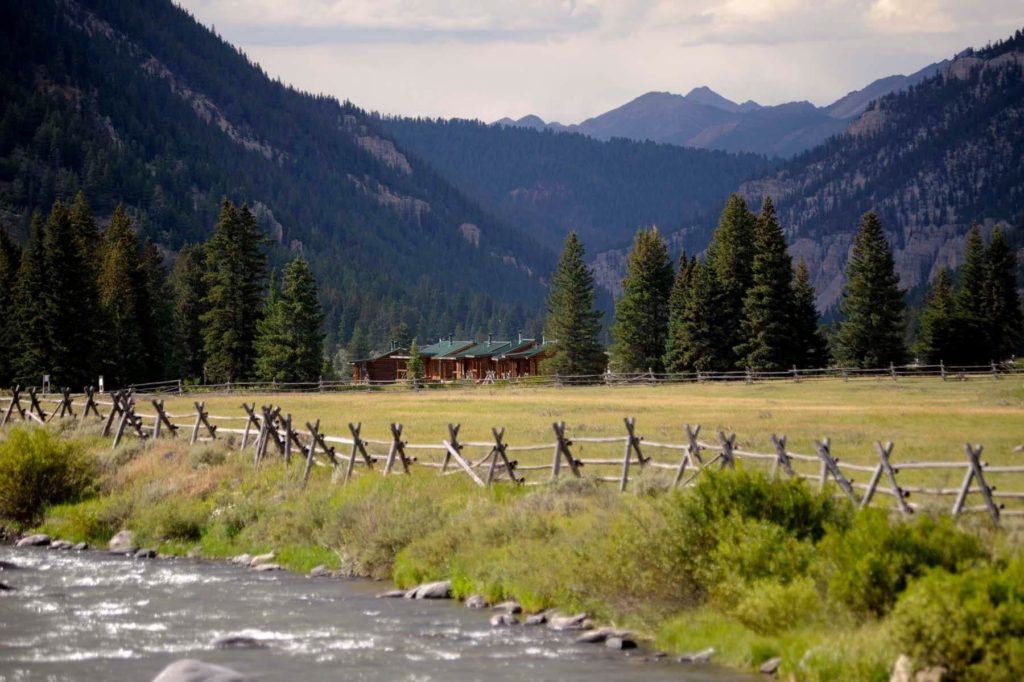 A far-out view of the main lodge at 320 Guest Ranch, a superior option to hotels in Bozeman.
