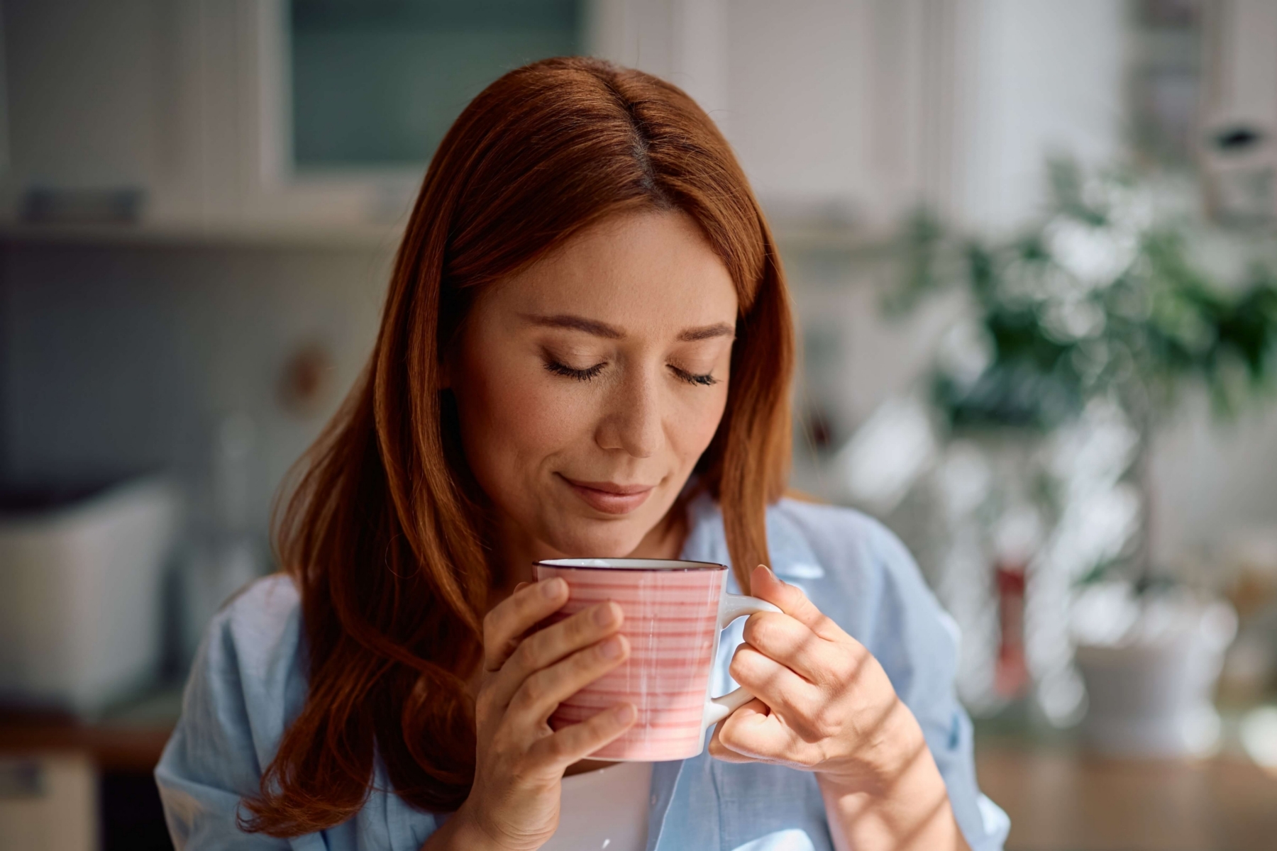 A woman enjoying Montana Coffee.